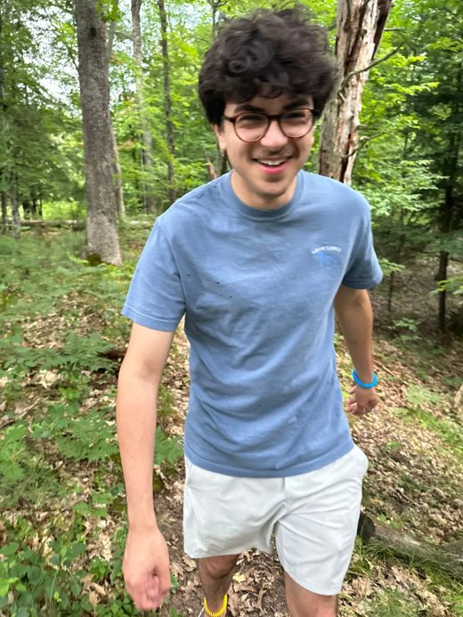 Gabe Hassan hiking in northern Michigan